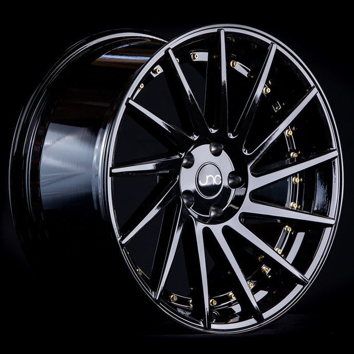 JNC051 | Gloss Black/Gold Rivets | 19x10.5 | 5x100/5x114.3 | +30mm | CB: 73.1